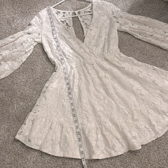 White Mini Dress with Long Bishop Sleeves and V-Neck - Picture 10 of 10